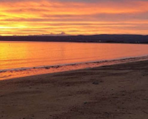sunset-with-alba-campers-at-fortrose-bay-campsite